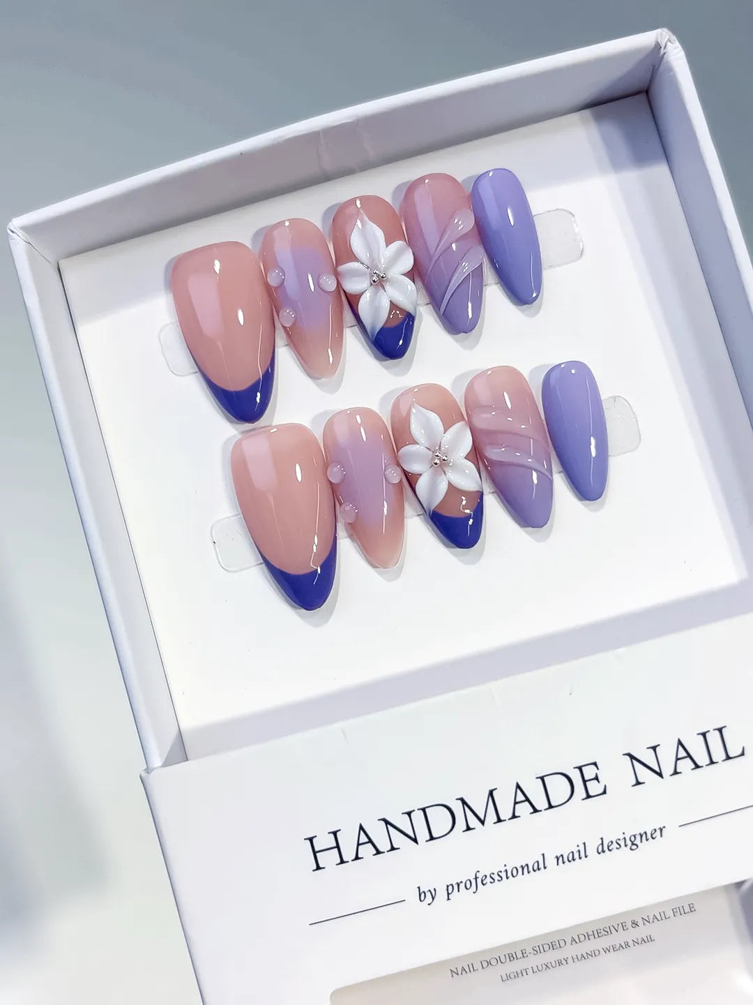 Nude Purple White French tip Flower Shell press on nails angled view