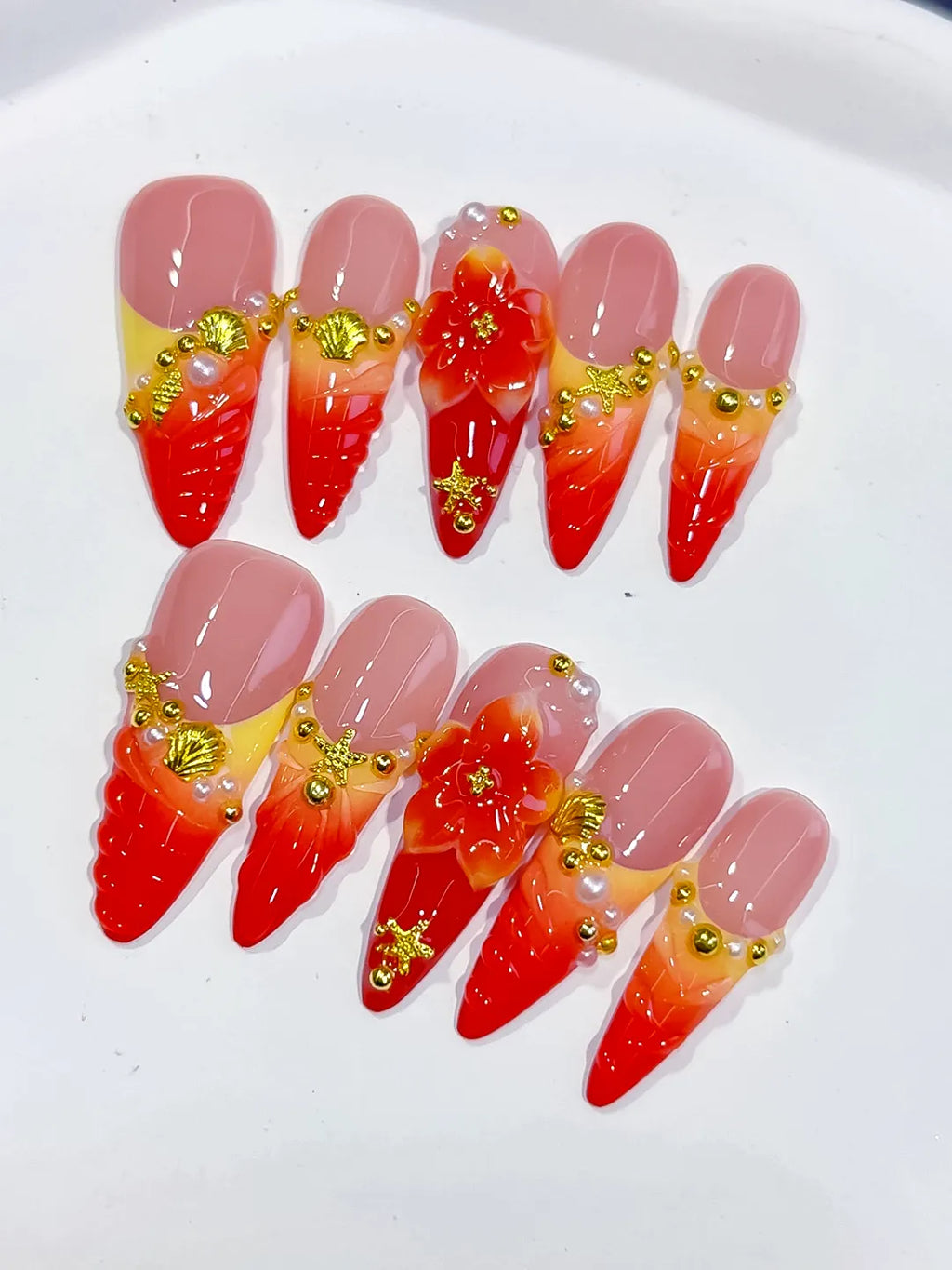 Nude Red Orange Gold French tip Flower Metallic Charm press on nails detail view