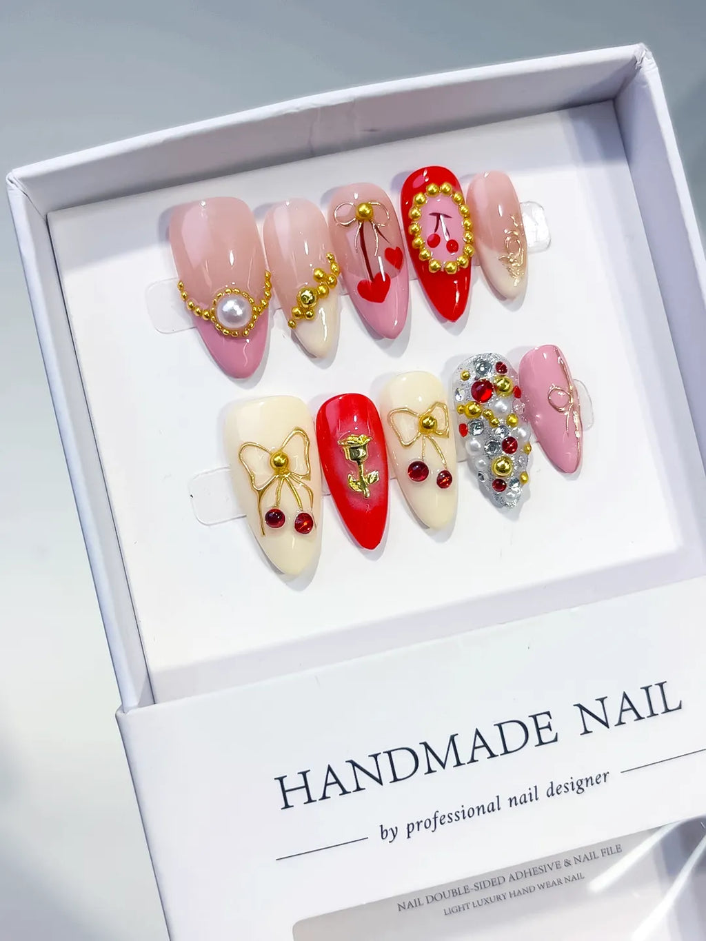 Pink Red Nude Silver Gold Abstract Heart Cherry Bow Rhinestone press on nails angled view