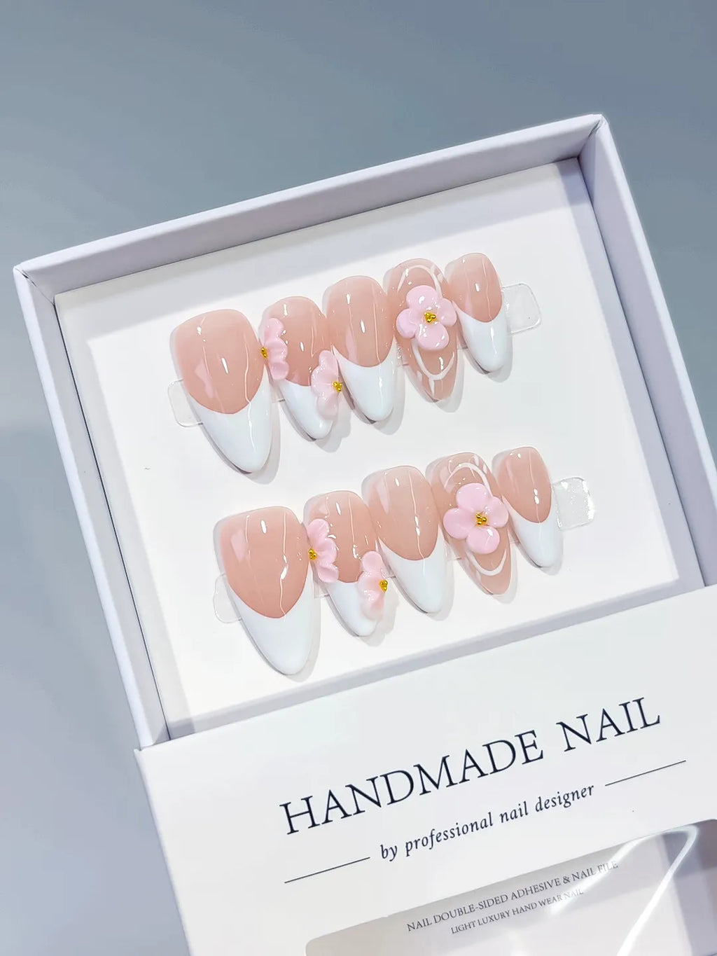 Nude White Pink French tip Flower press on nails angled view