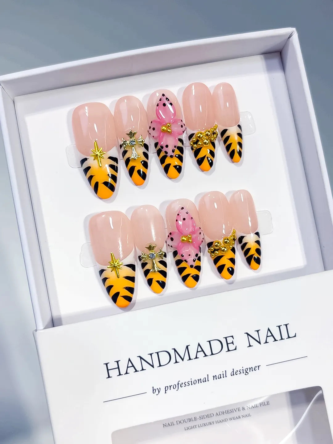 Nude Yellow Pink Black Gold French tip Animal Print Bow Heart Stud press on nails angled view