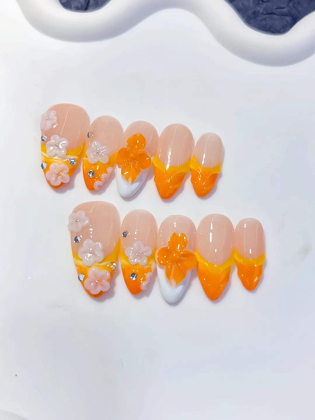 Nude Orange White French tip Flower Rhinestone press on nails close up