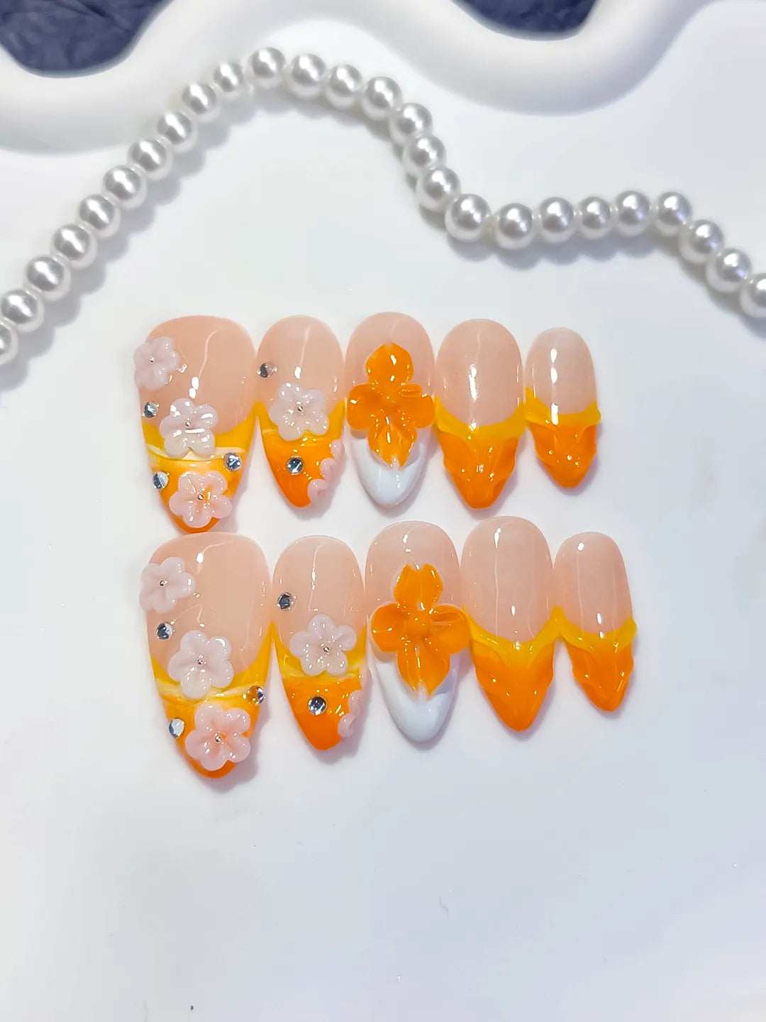 Nude Orange White French tip Flower Rhinestone press on nails detail view