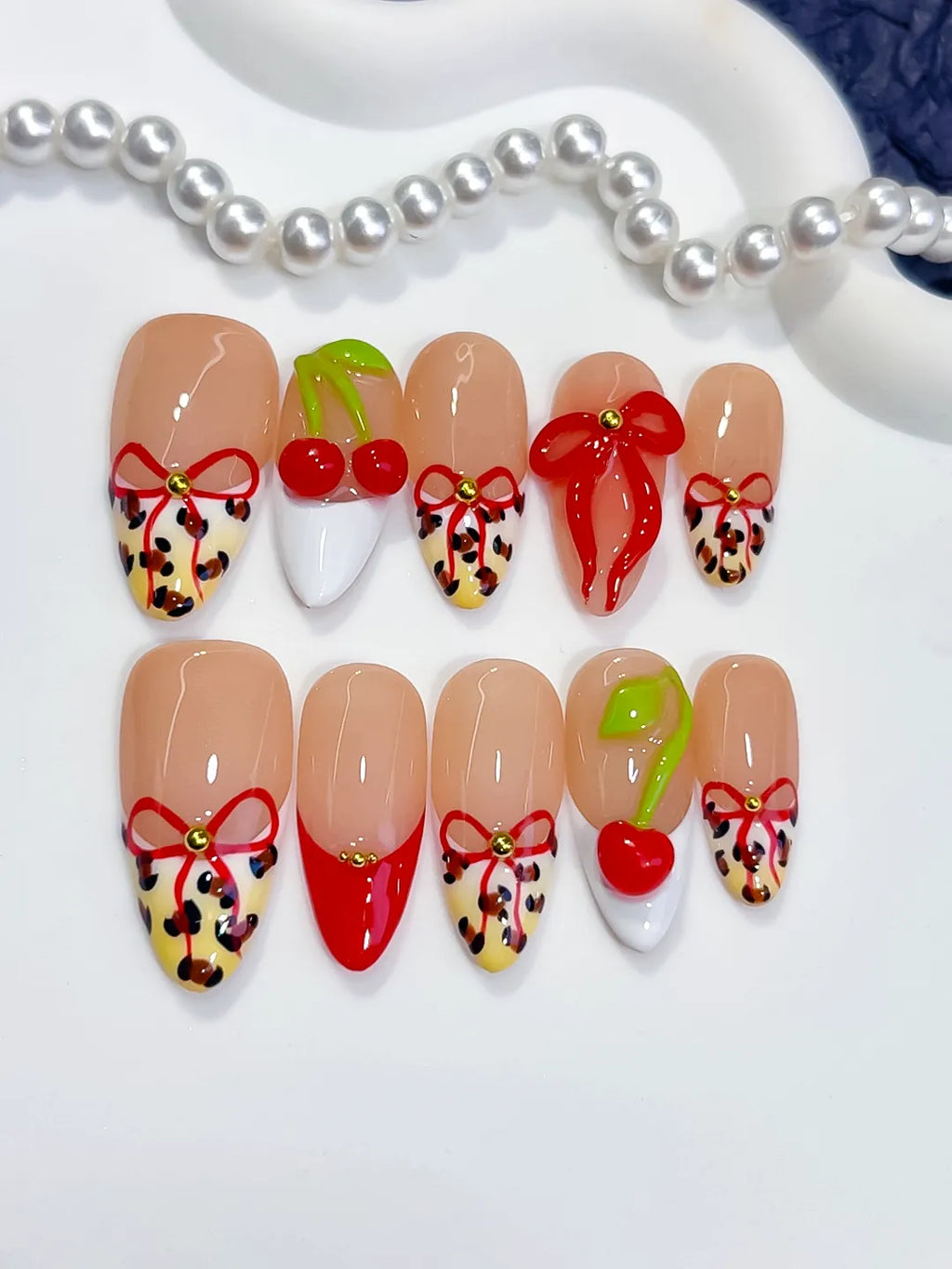Nude Red White Abstract Bow Cherry Animal Print press on nails close up
