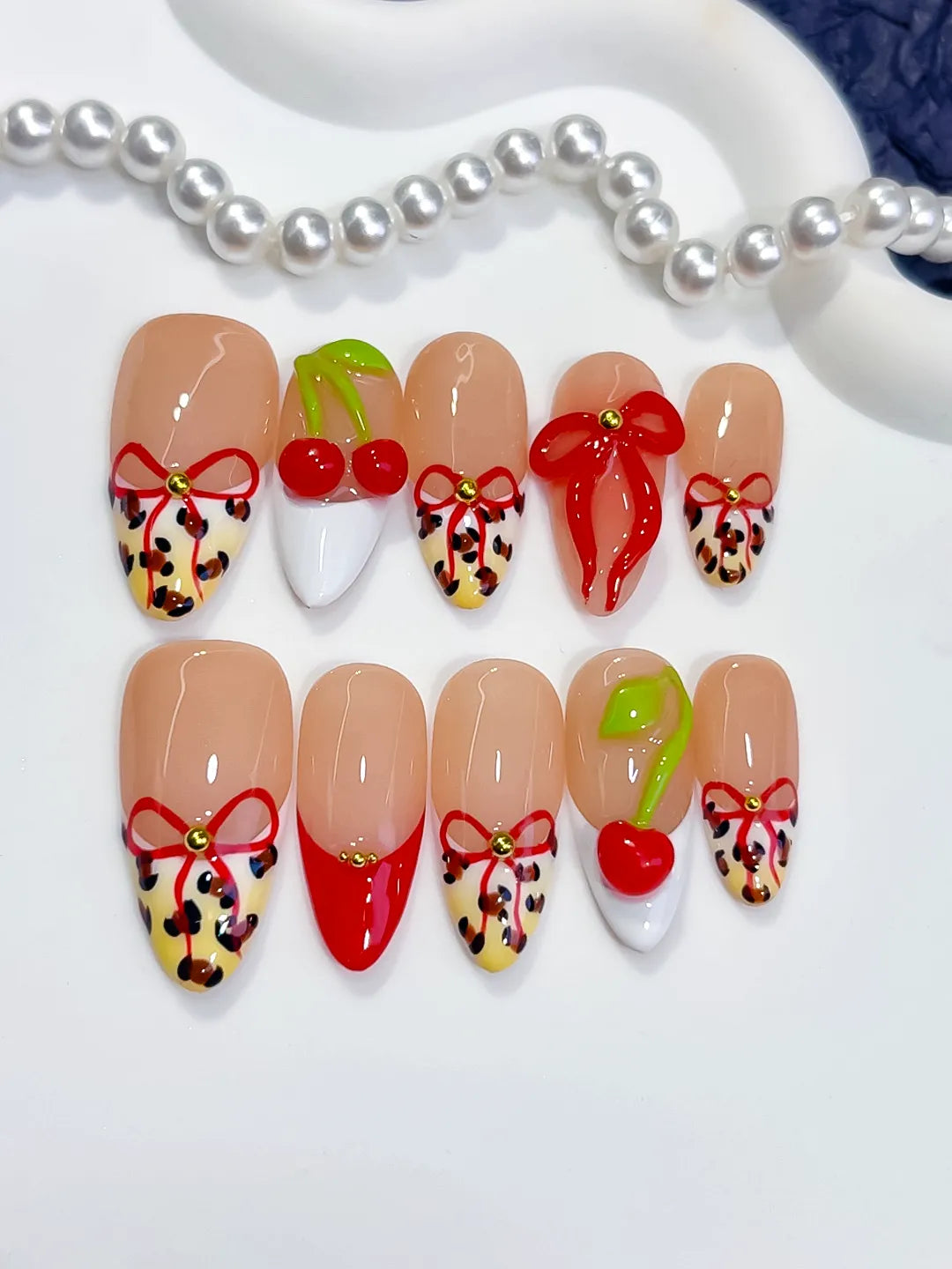 Nude Red White Abstract Bow Cherry Animal Print press on nails close up