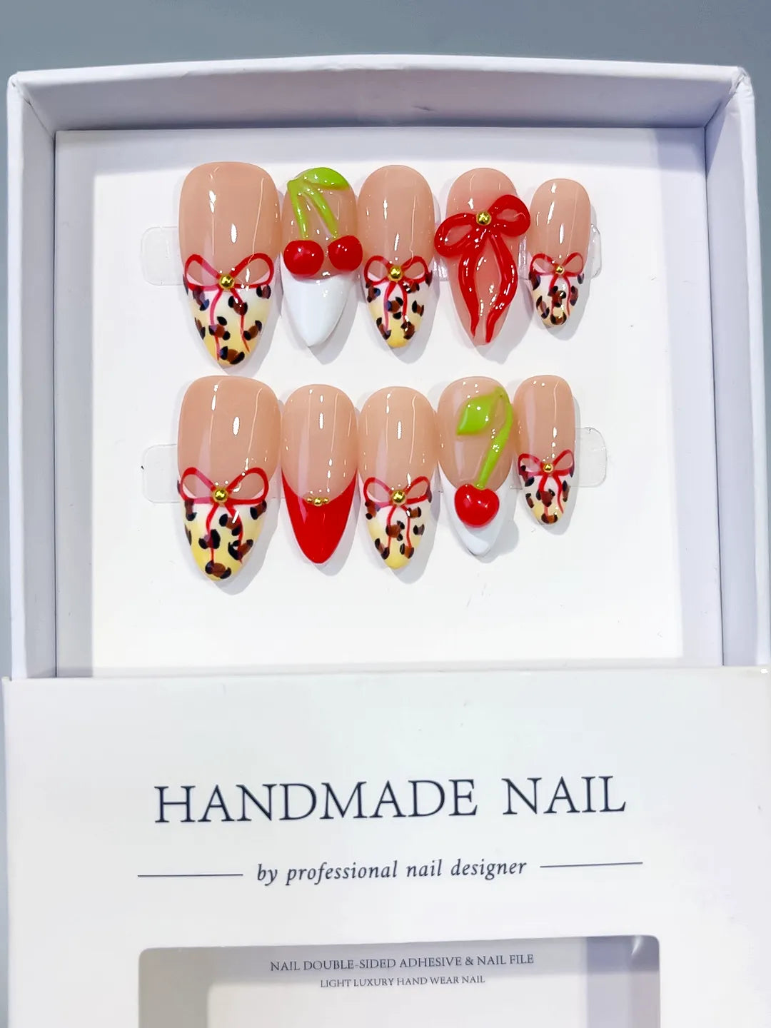 Nude Red White Abstract Bow Cherry Animal Print press on nails full set view