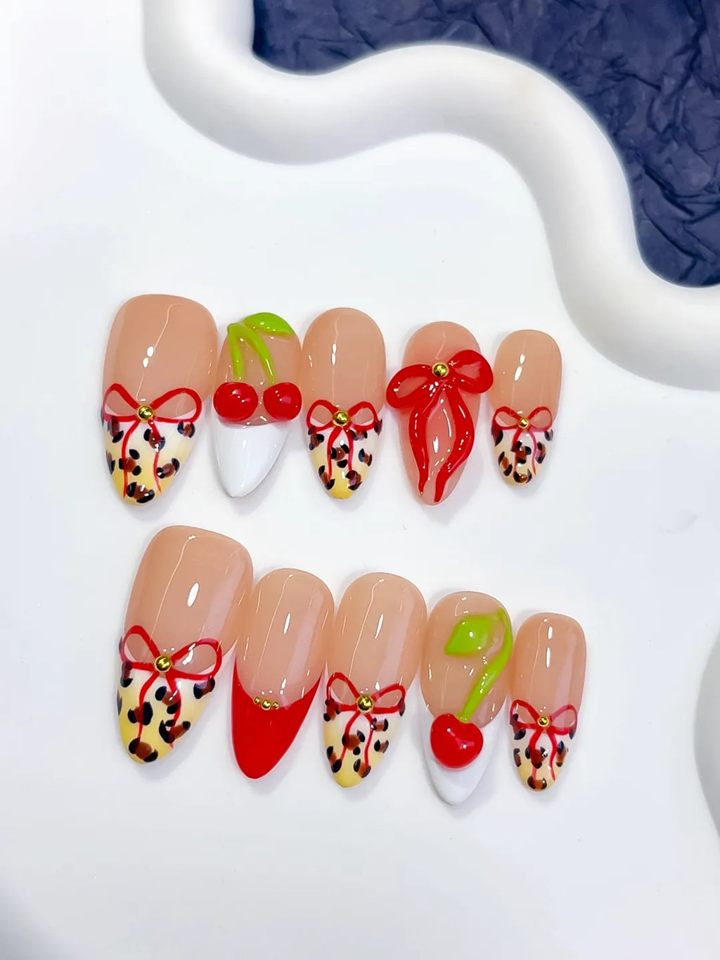 Nude Red White Abstract Bow Cherry Animal Print press on nails detail view