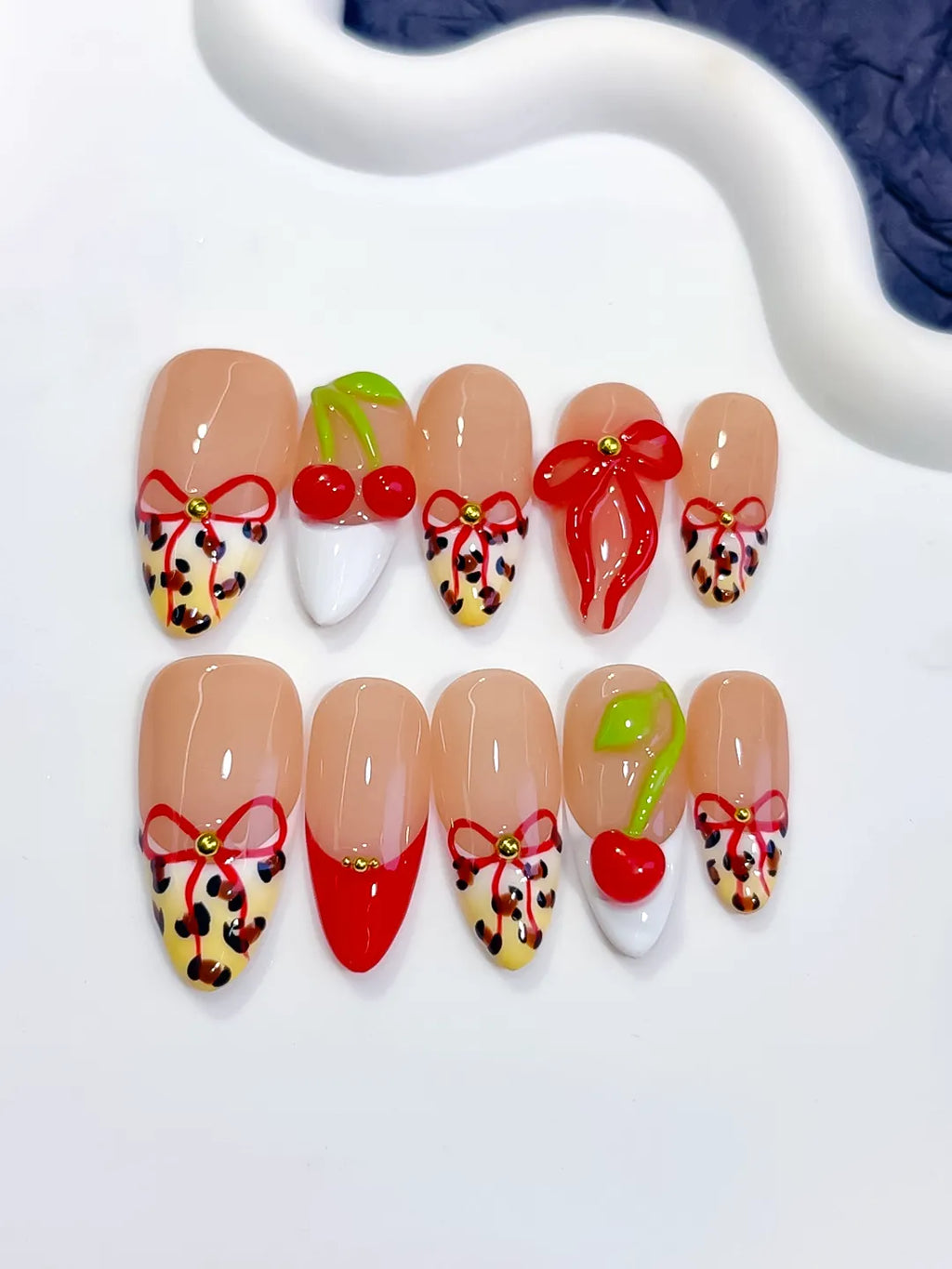 Nude Red White Abstract Bow Cherry Animal Print press on nails detail view