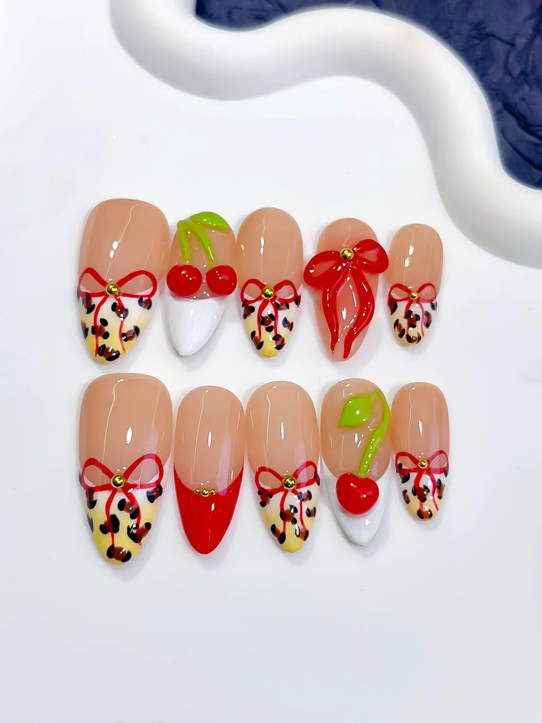 Nude Red White Abstract Bow Cherry Animal Print press on nails detail view