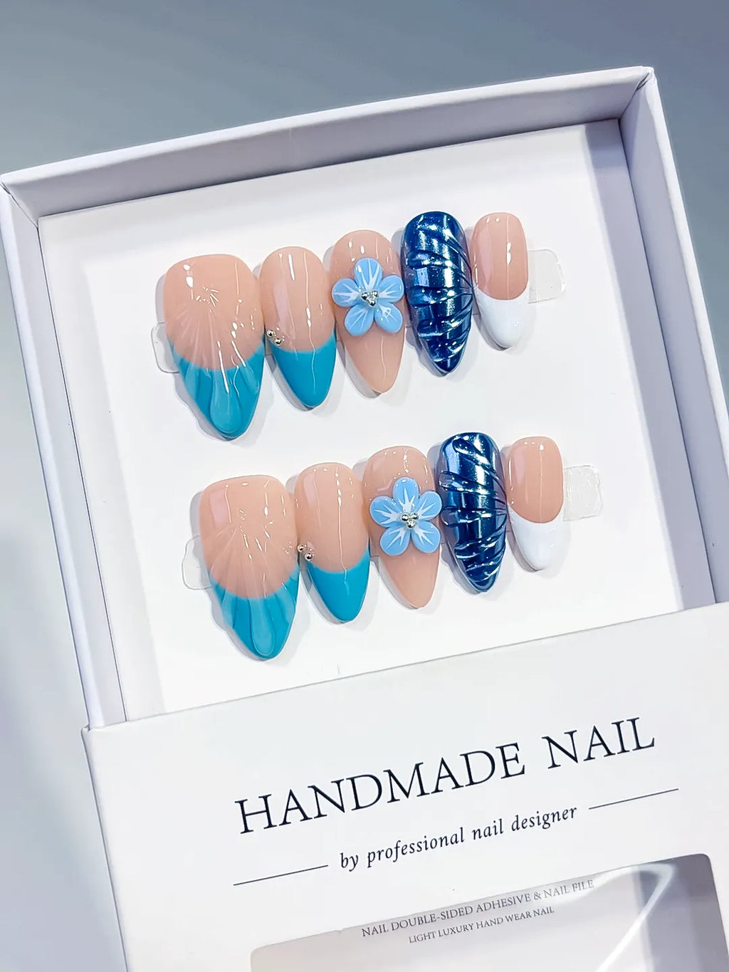 Nude Blue White French tip Flower Cat Eye press on nails angled view