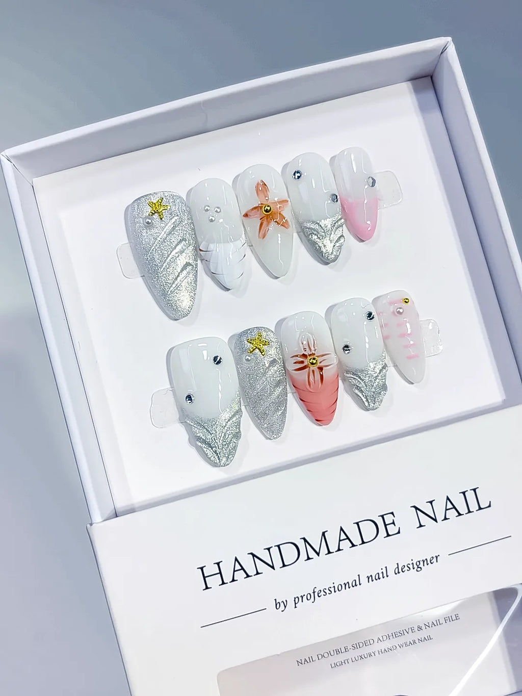 White Silver Orange Pink Glitter Flower Star Shell press on nails angled view
