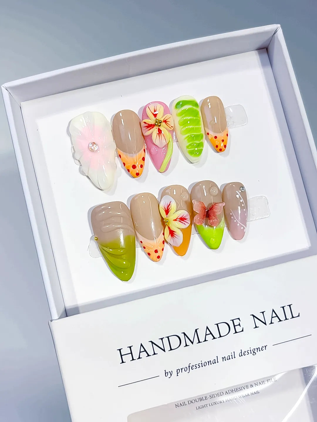 Nude Green Orange Pink Abstract Flower Fruit Dot Pattern press on nails angled view