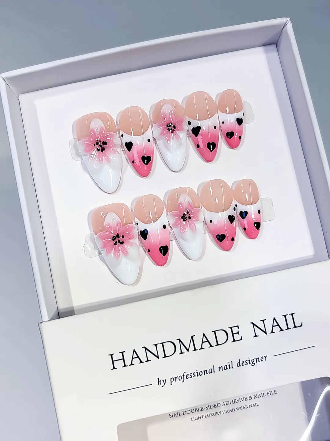 Pink White Black French tip Flower Heart press on nails angled view