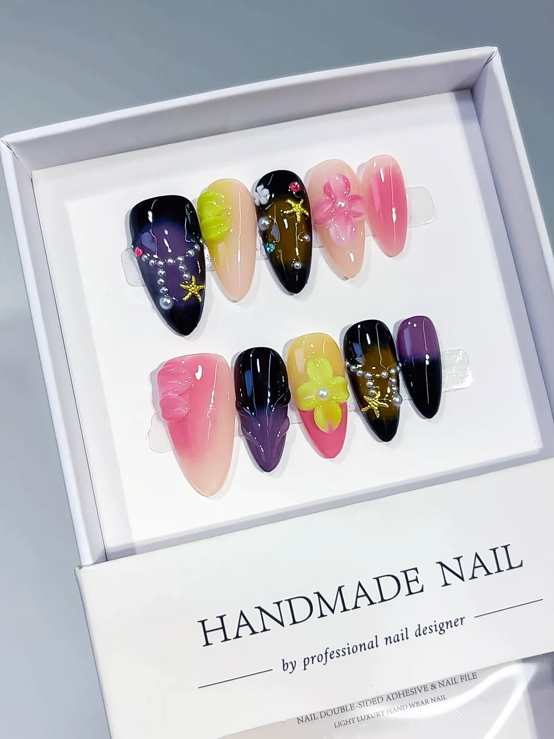 Pink Black Purple Green Yellow Abstract Flower Star Rhinestone press on nails angled view