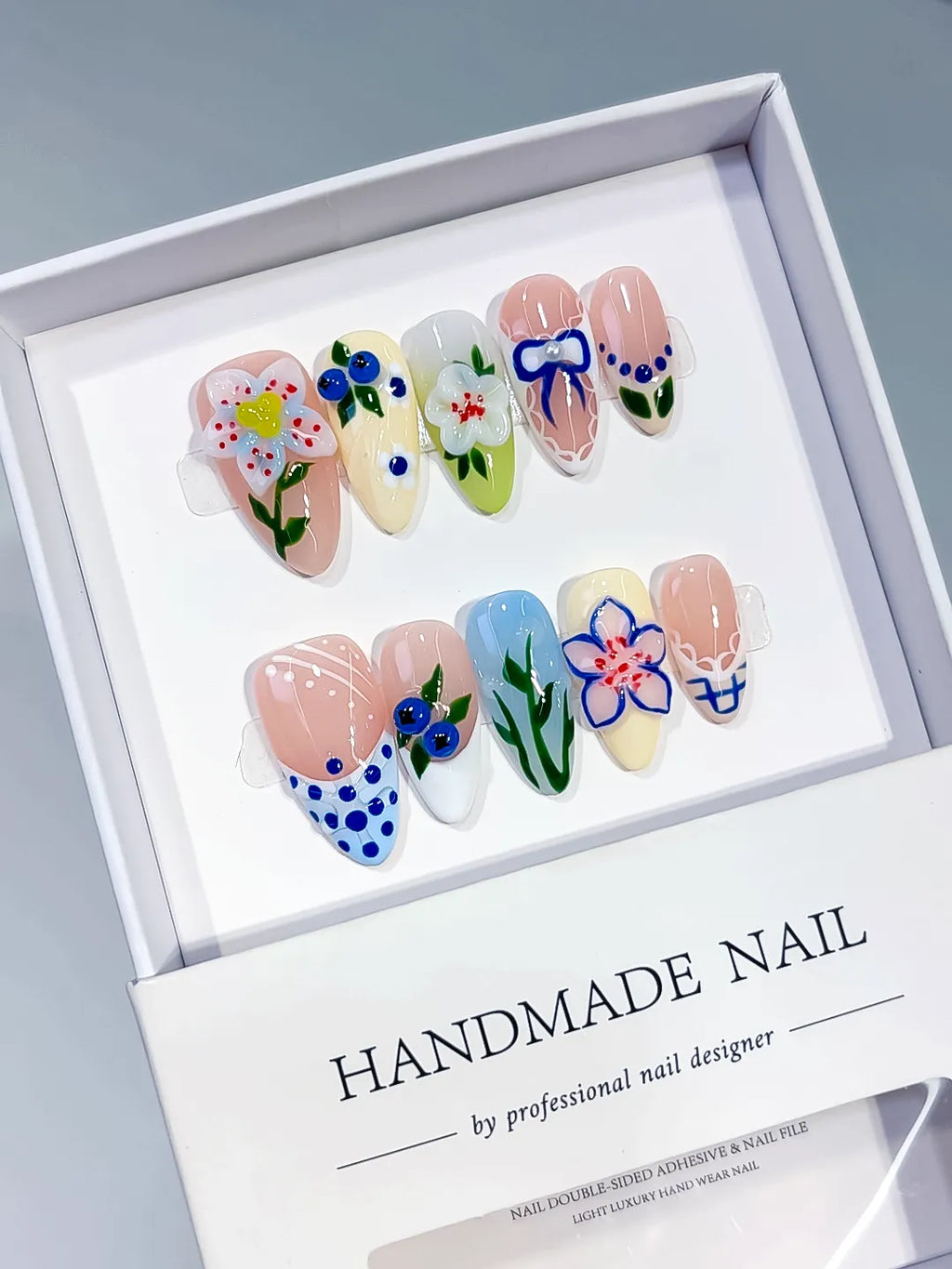 Nude White Blue Green Abstract Flower Leaf Berry press on nails angled view