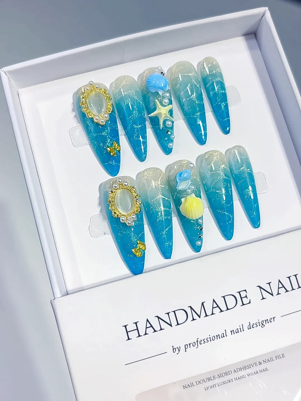 Blue Silver Gold Glitter Pearl Star Metallic Charm press on nails angled view