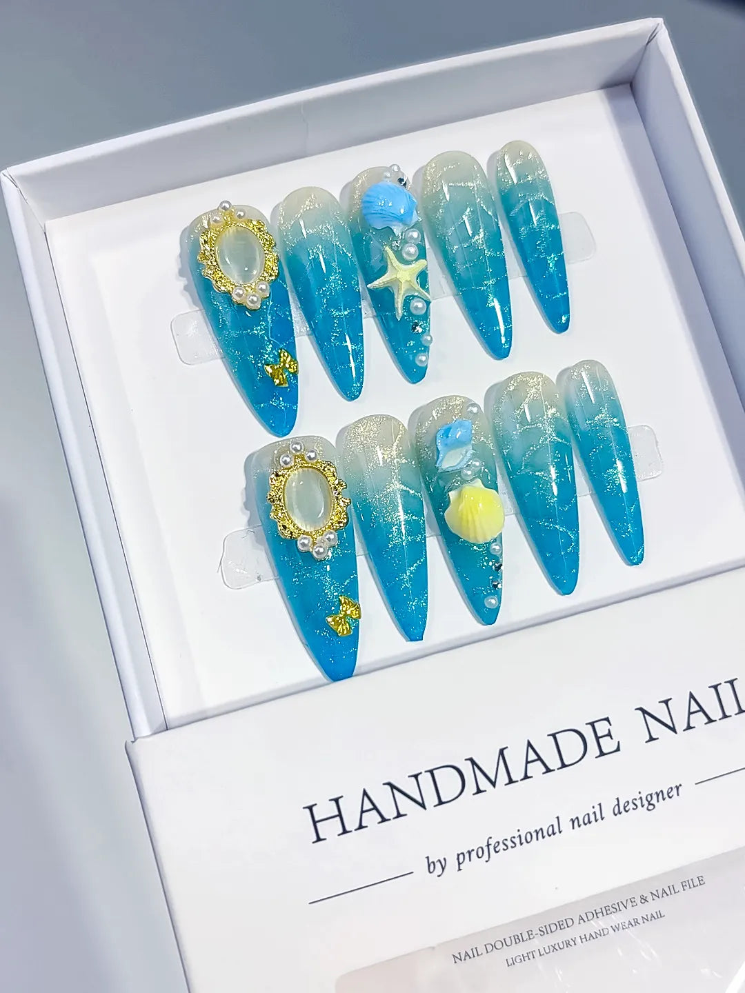 Blue Silver Gold Glitter Pearl Star Metallic Charm press on nails angled view