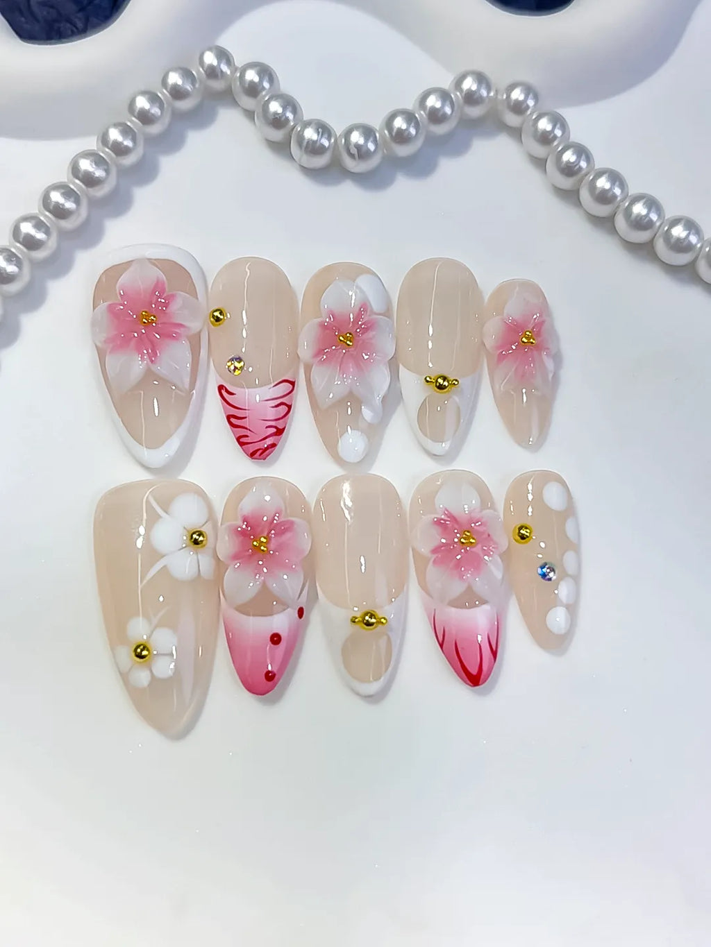 Nude Pink White French tip Flower Dot Pattern press on nails close up