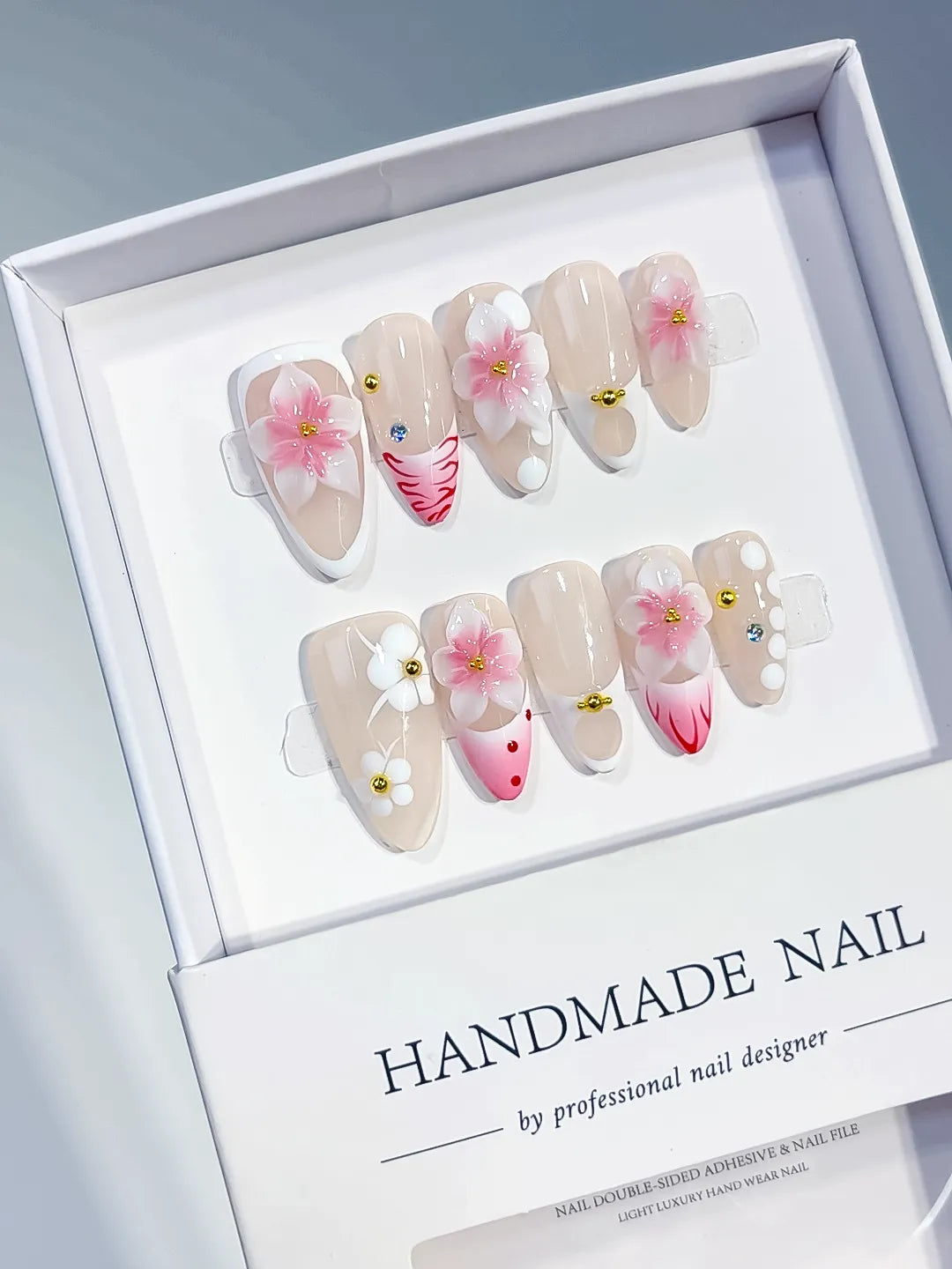 Nude Pink White French tip Flower Dot Pattern press on nails angled view