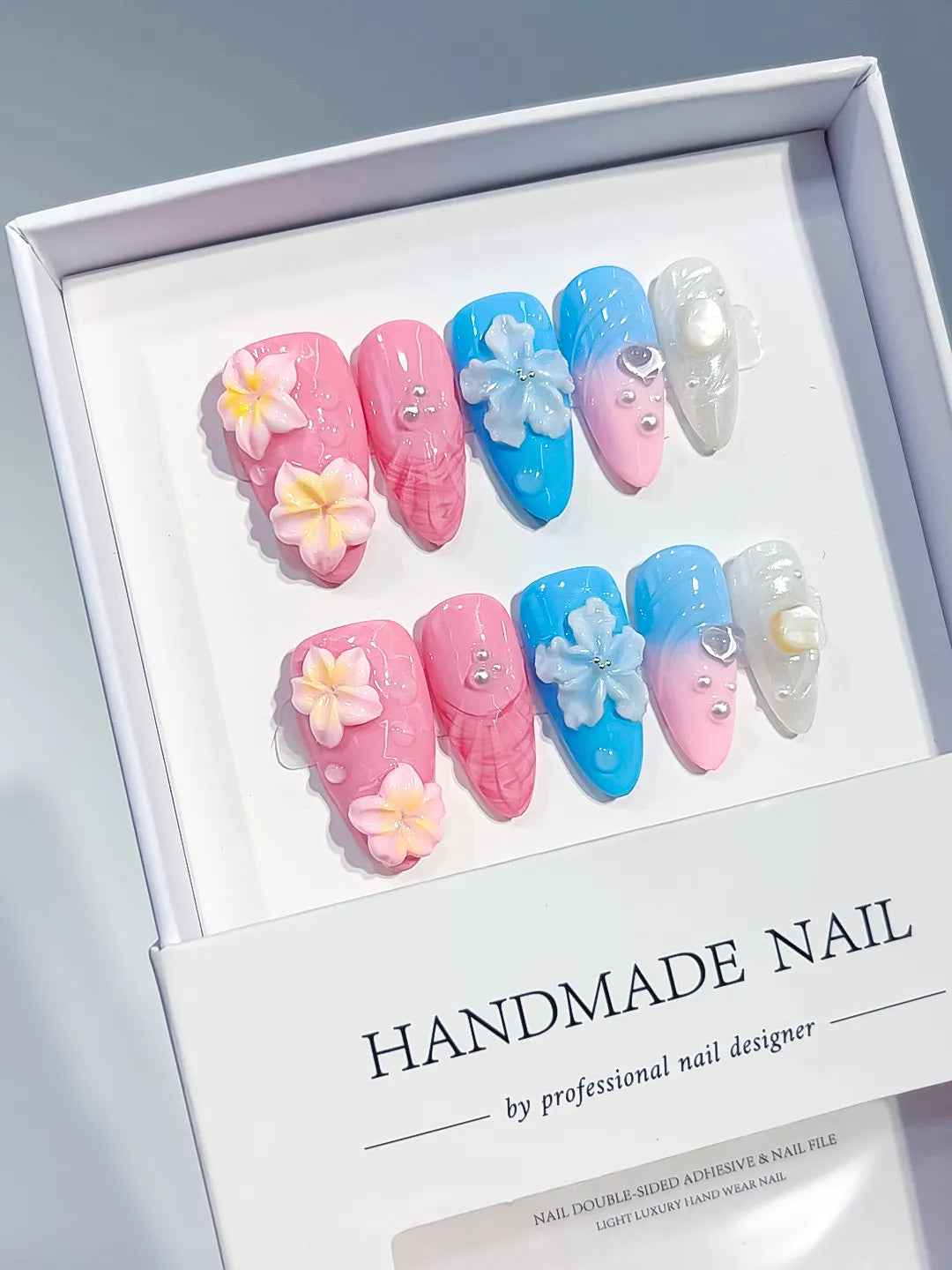 Pink Blue White Silver Abstract Flower Shell Pearl press on nails angled view