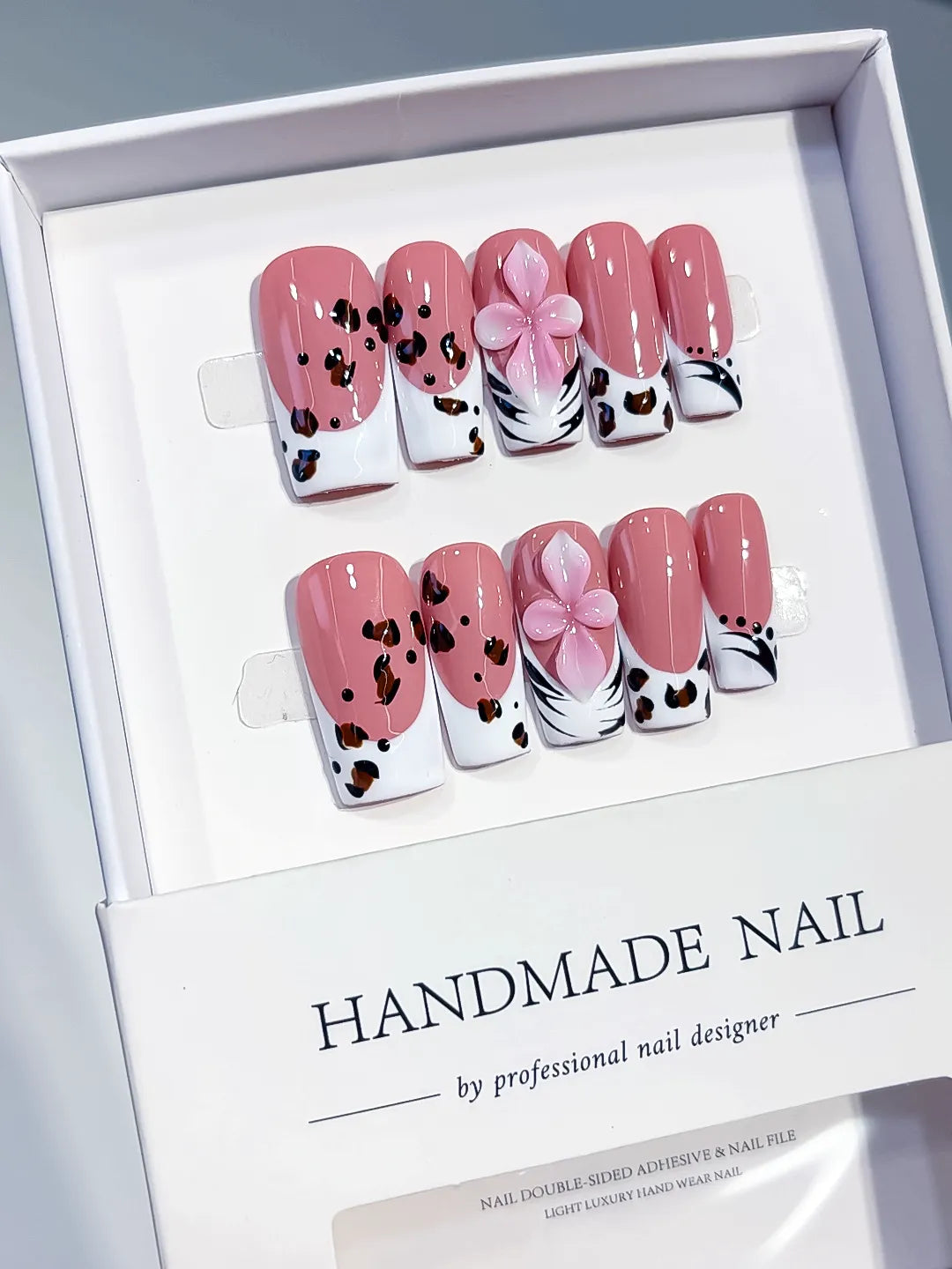 Pink White Brown Black Abstract Flower Animal Print press on nails angled view