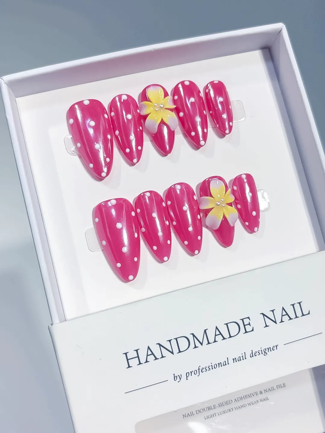 Pink White Geometric Flower press on nails angled view