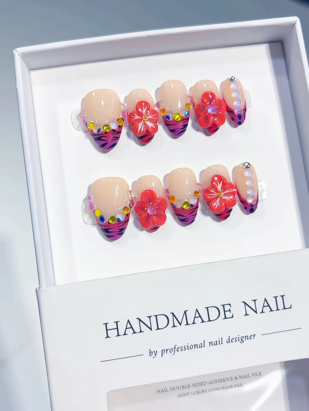 Nude Pink Purple Black Red Abstract Flower Animal Print Rhinestone press on nails angled view