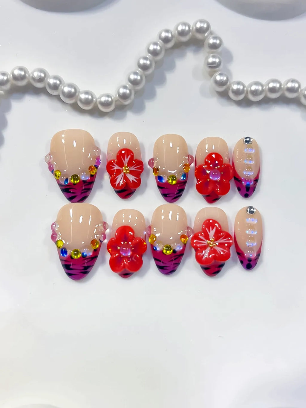 Nude Pink Purple Black Red Abstract Flower Animal Print Rhinestone press on nails detail view