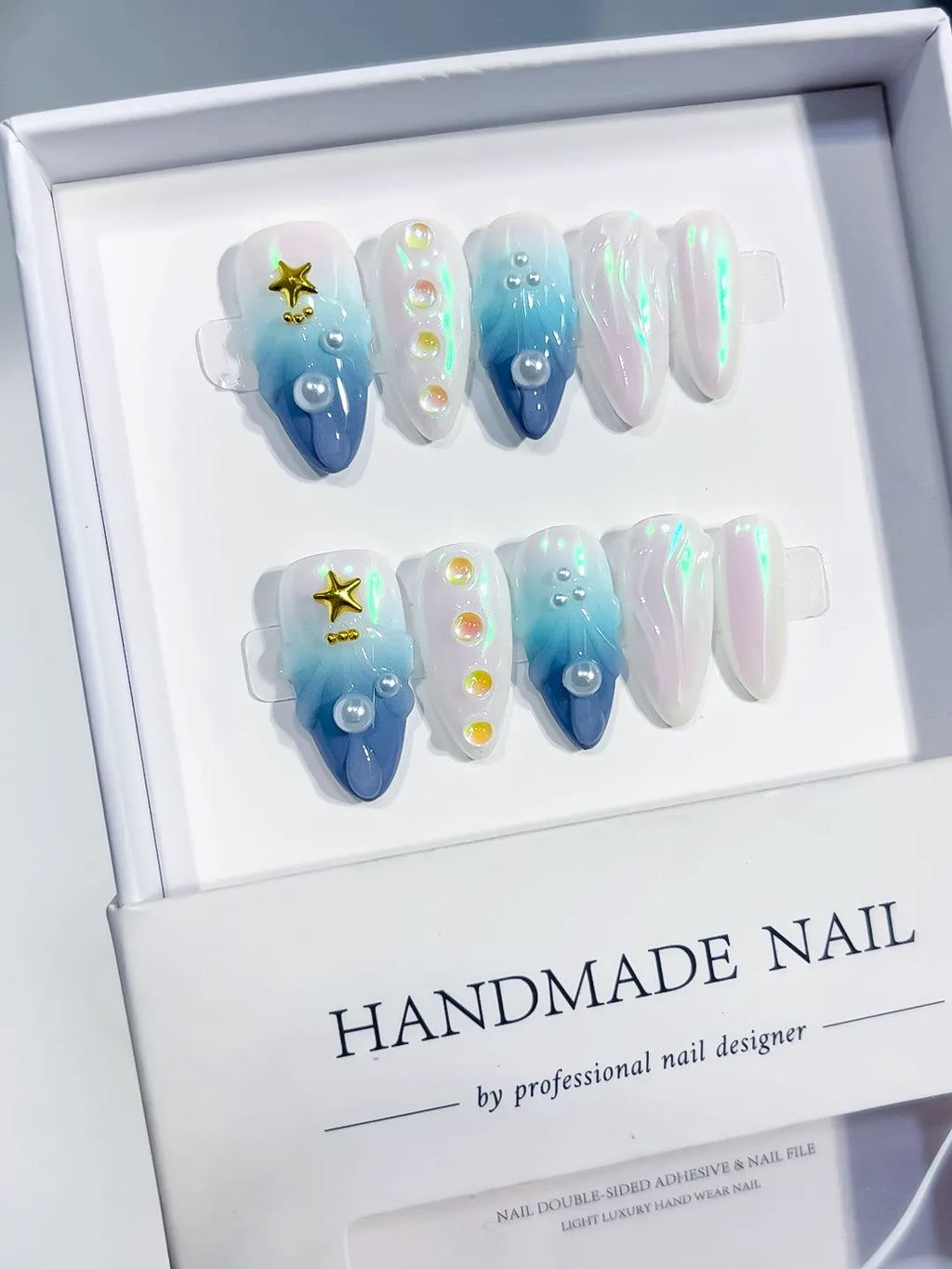 Blue White Multicolor Gold Holographic Pearl Star Shell press on nails angled view