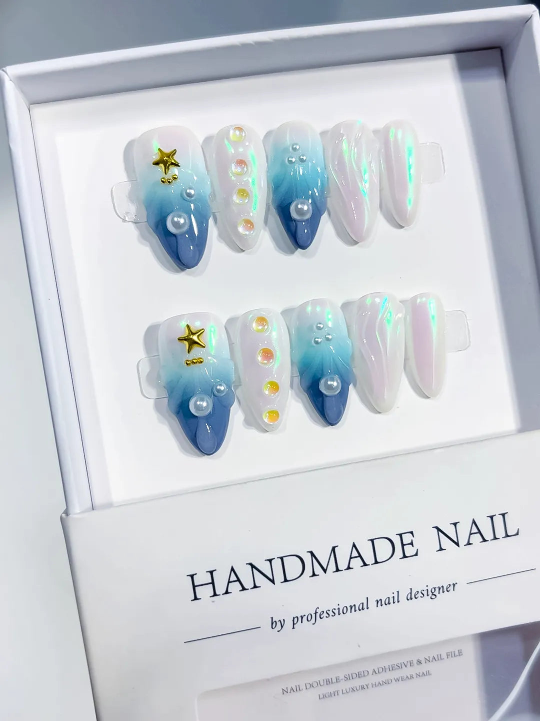 Blue White Multicolor Gold Holographic Pearl Star Shell press on nails angled view