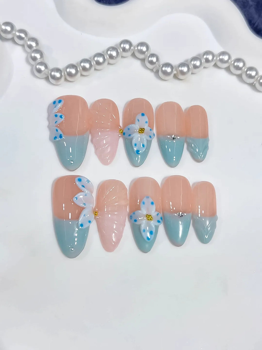 Nude Blue White French tip Flower Bow Shell press on nails detail view
