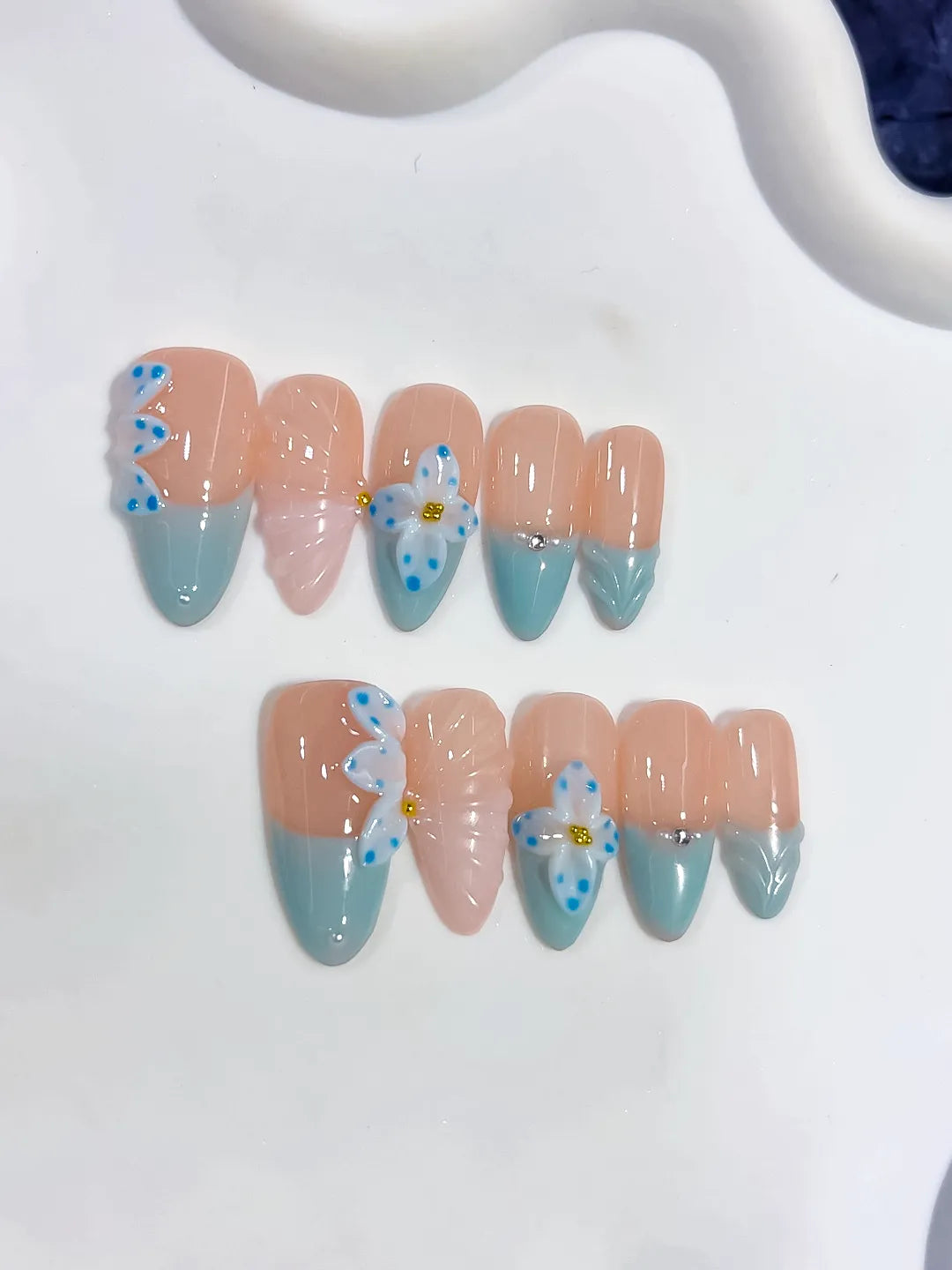 Nude Blue White French tip Flower Bow Shell press on nails detail view