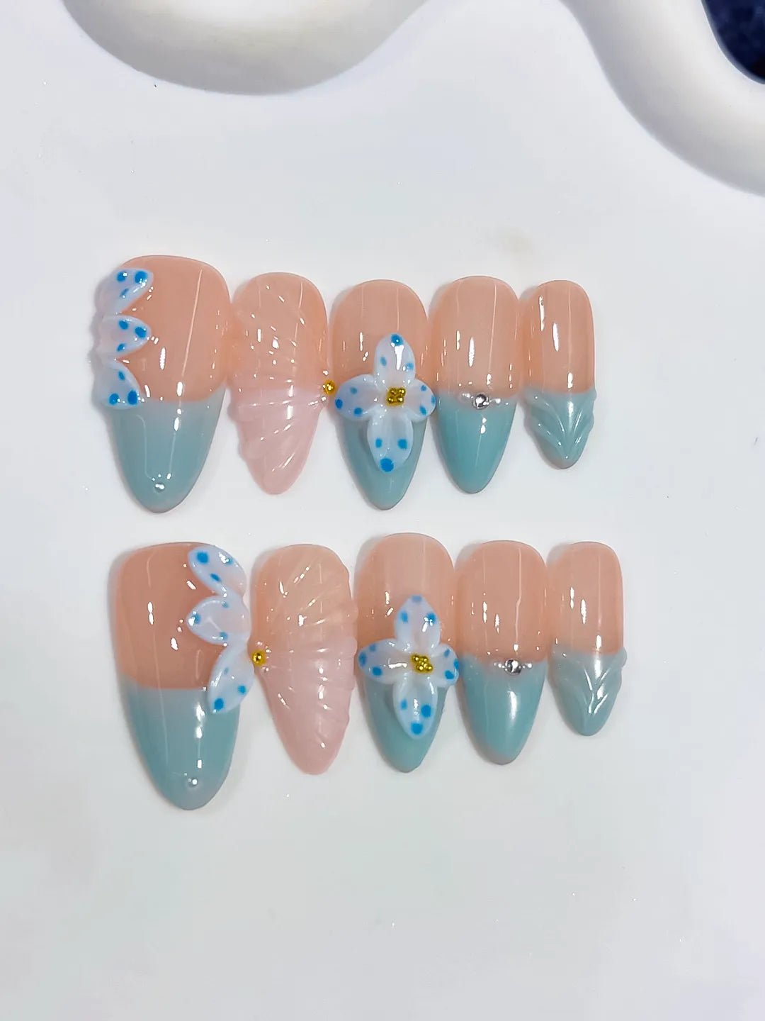 Nude Blue White French tip Flower Bow Shell press on nails close up