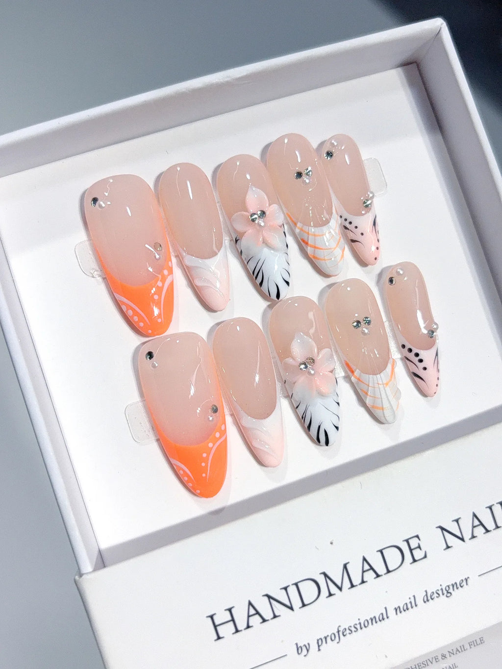 D649 - Long Nude Orange Almond French Tip Silver Line Bows - view 1