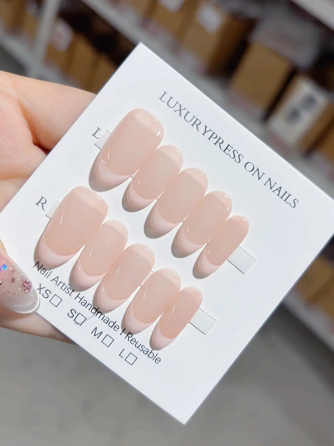 Glossy nude pink handmade press on nails centerpiece layout