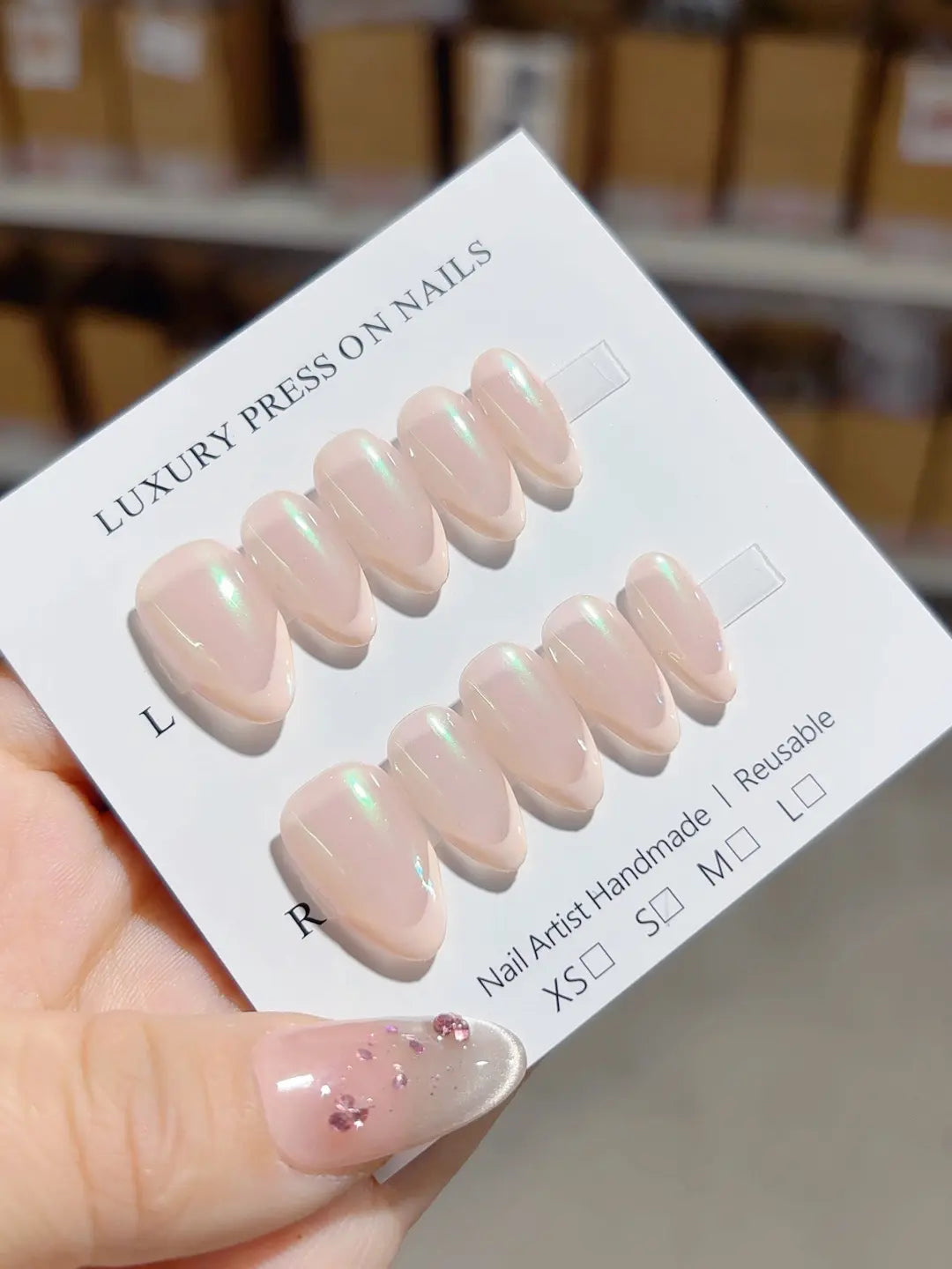 Handmade press on nails reusable almond nude with green aurora shine, full set display