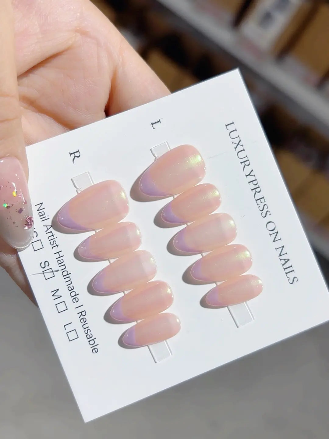 Handmade press on nails reusable nude almond with shimmering aurora finish, elegant detail