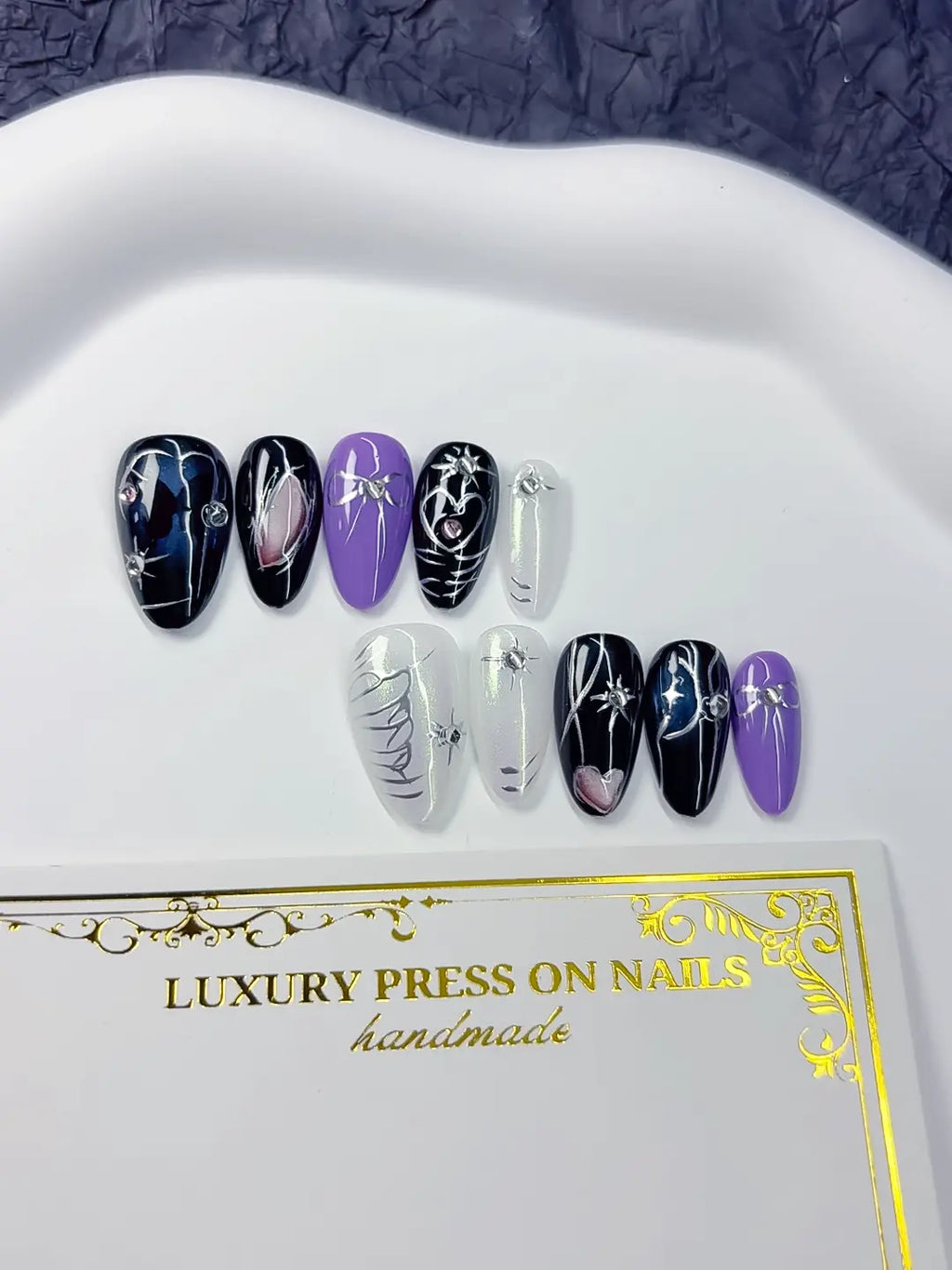 Handmade press on nails short almond black purple with butterfly and heart accents centerpiece