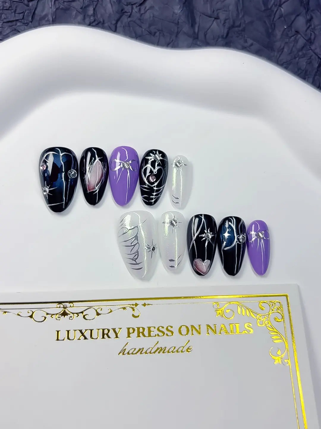 Handmade press on nails short almond black purple with butterfly and heart accents centerpiece