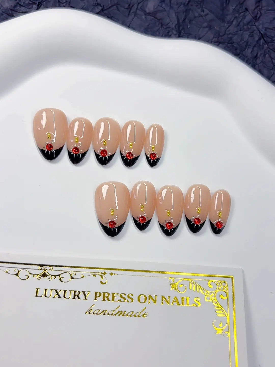 Handmade press on nails short almond nude French style set with roses angled view