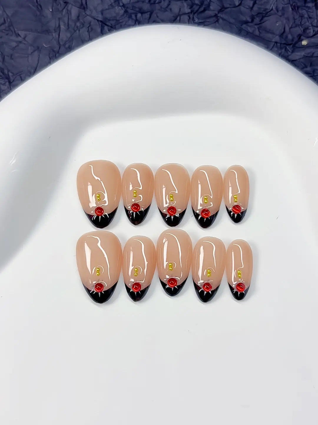 Handmade press on nails short almond nude with French black tips and red rose centerpiece