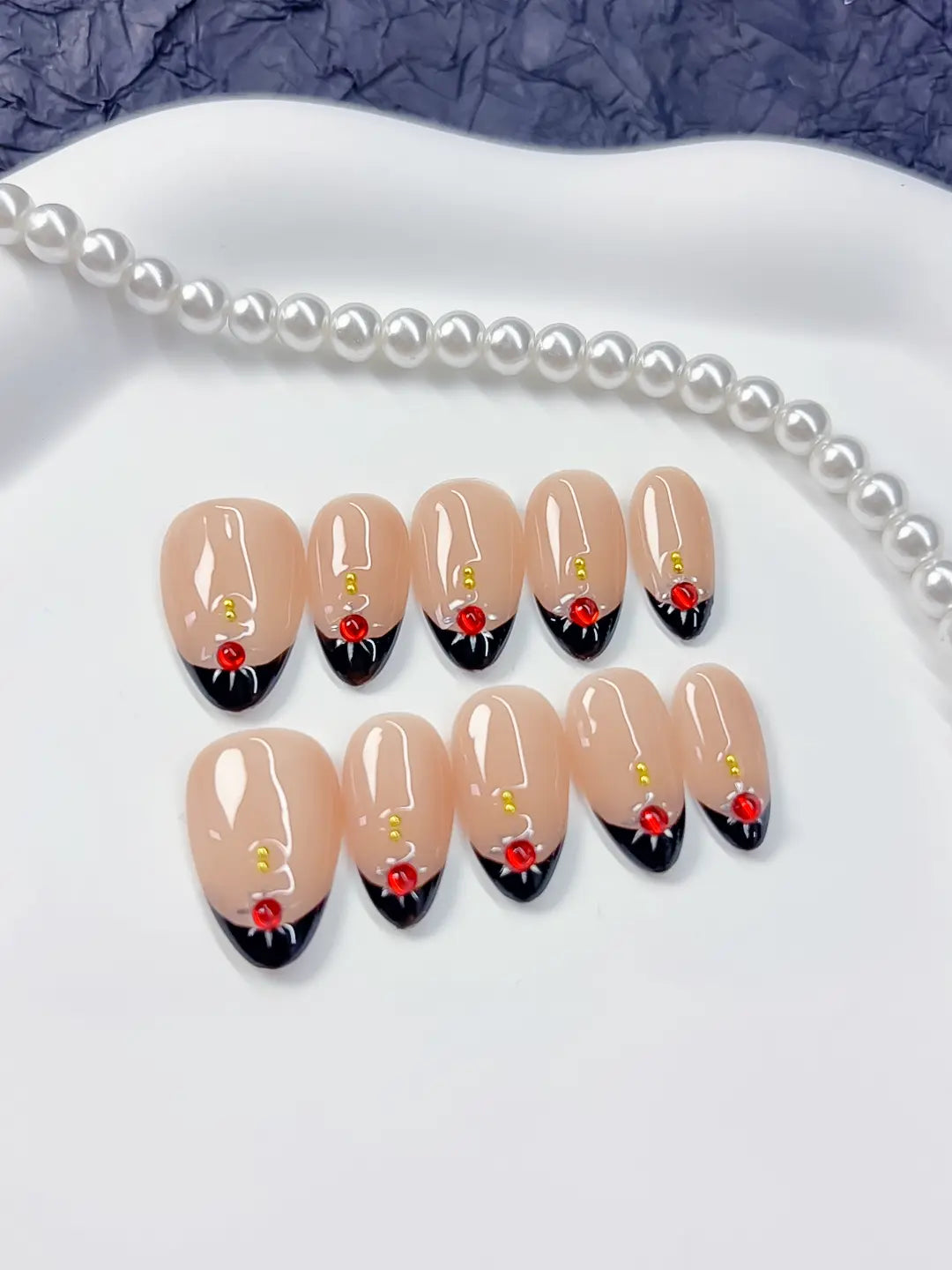 Handmade press on nails short almond nude with red rose detail and gold accent
