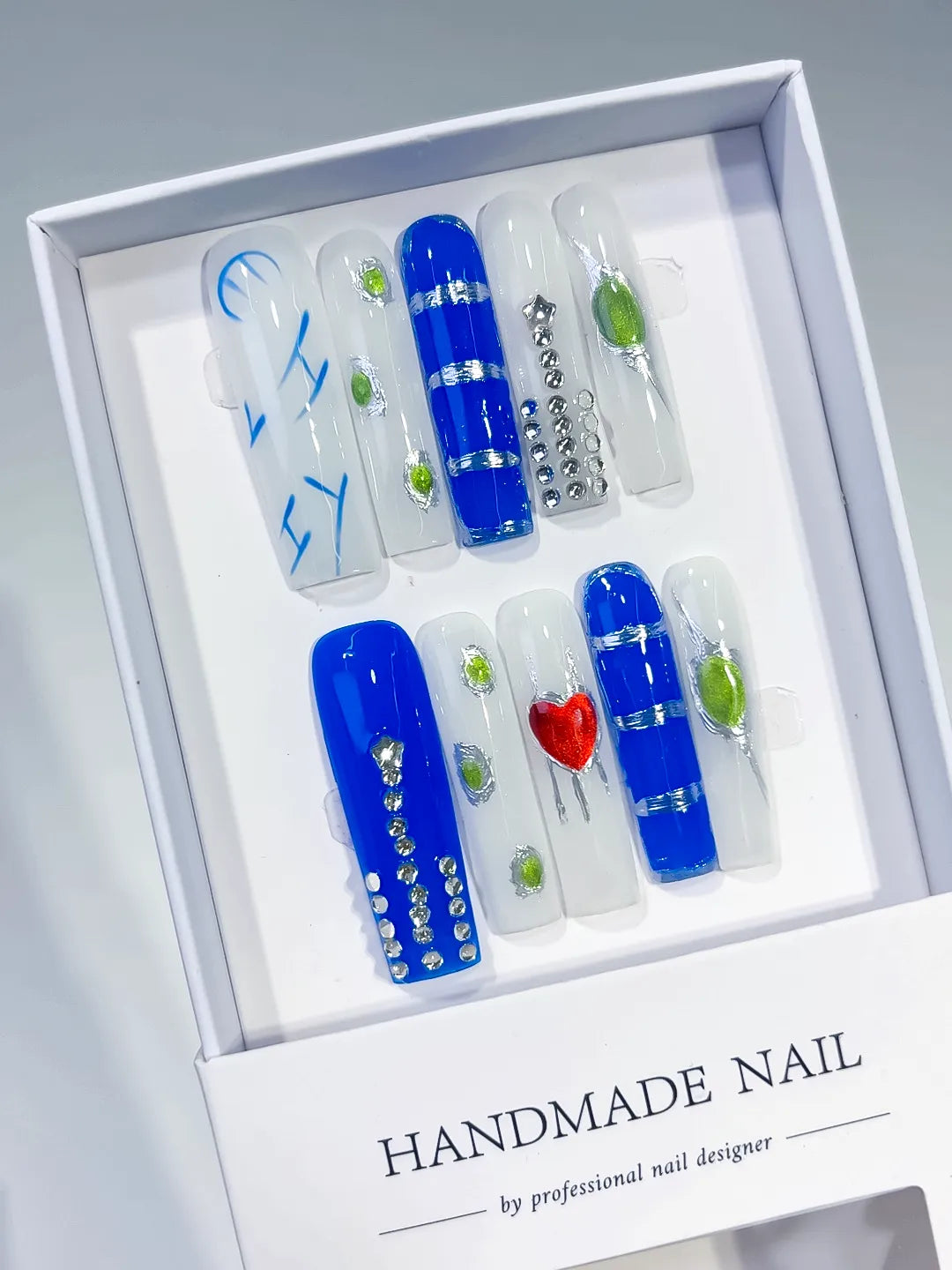 Blue White Green Red Silver Abstract Rhinestone Heart 3D press on nails angled view