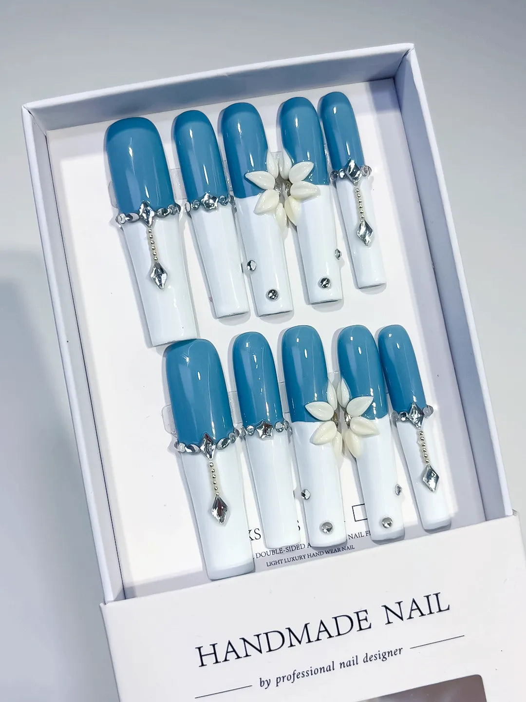 Blue White Silver French tip Flower Chain Rhinestone press on nails angled view