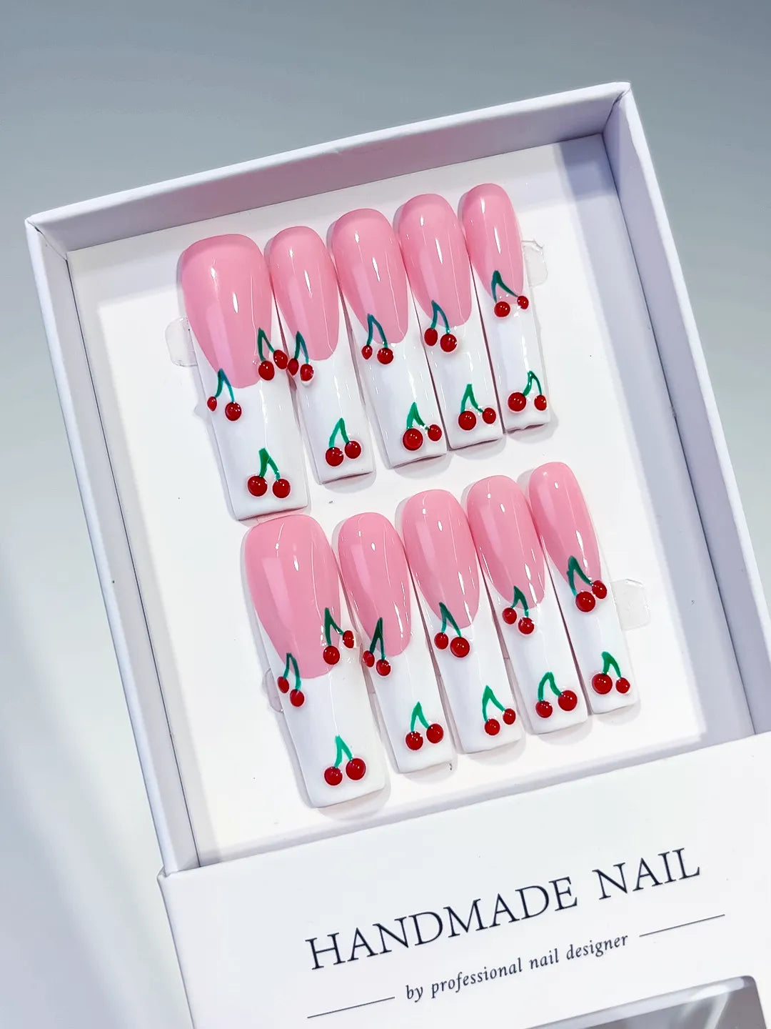 Pink White Red Green Floral Cherry press on nails angled view