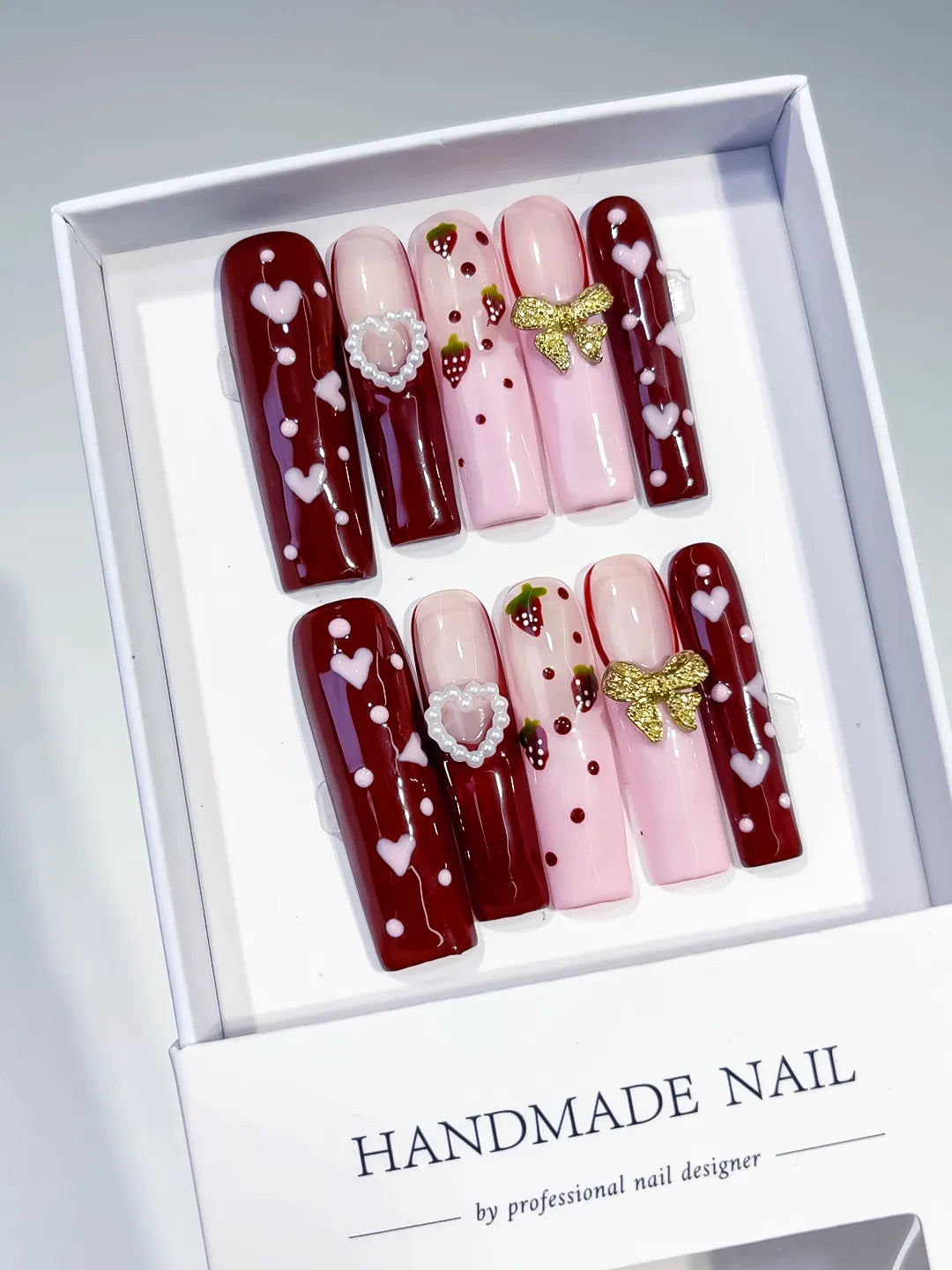 Red Pink White Gold Green Floral Heart Strawberry Bow Pearl 3D press on nails angled view