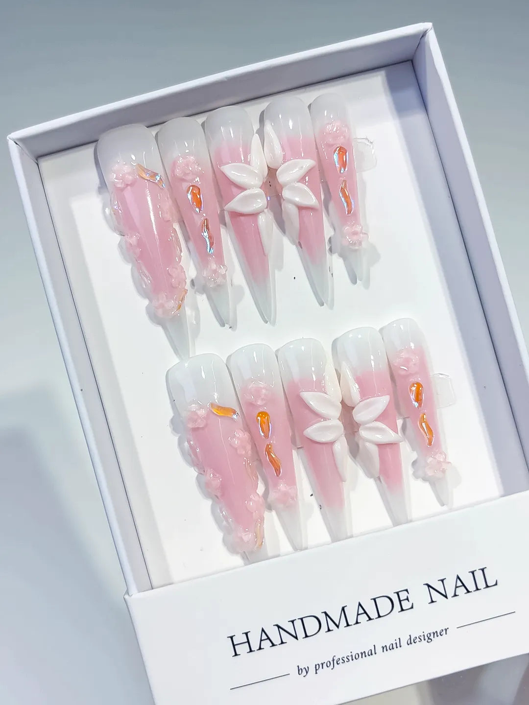 Pink White Orange Ombre Flower 3D press on nails angled view