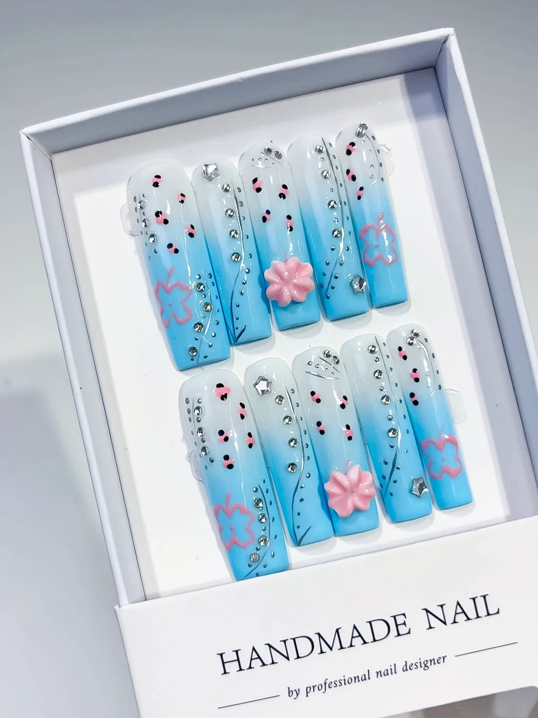 Blue White Pink Silver Black Ombre Flower Rhinestone press on nails angled view