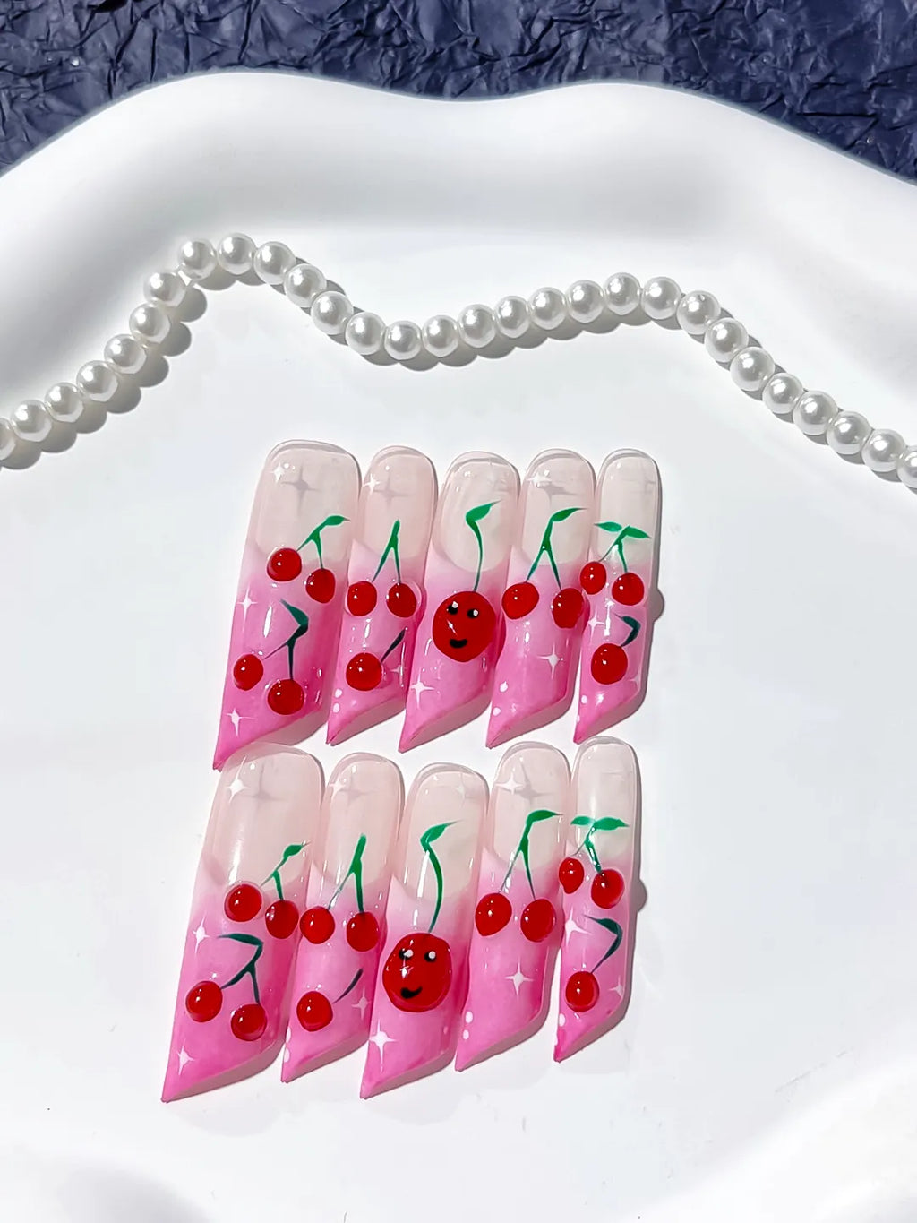 Pink Red Green Floral Cherry Face press on nails detail view