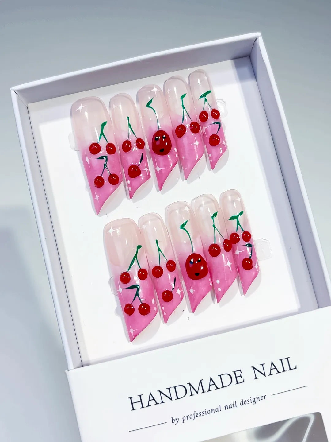 Pink Red Green Floral Cherry Face press on nails angled view